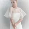 KJØP Brudeponcho organza med swarovski EMMERLING i NORGES STØRSTE NETTBUTIKK FOR BRUDEN OG BRYLLUPSANTREKK. ABELONE.NO